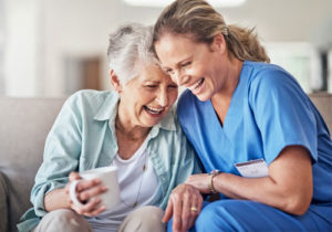 Two women share a laugh