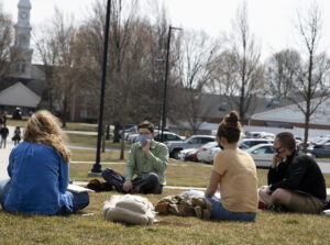 students and professor in outdoor class