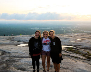 Three LBC students pictured are teaching English to refugees through a summer internship in Georgia