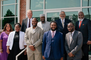 Representatives from PEKBA and LBC | Capital gather in front of the Teague Learning Commons on Aug. 4, 2021.