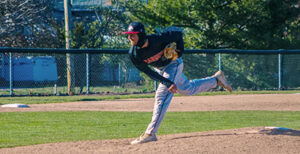 Colburn throws a pitch.