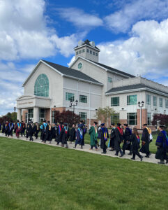 faculty members processing for graduation