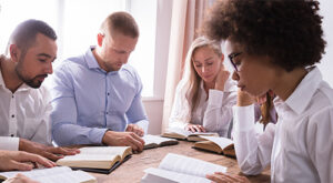 group around table studying ministry