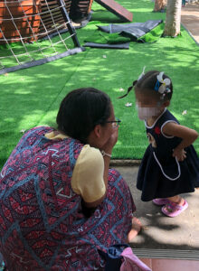 an lbc student and a little girl in thailand