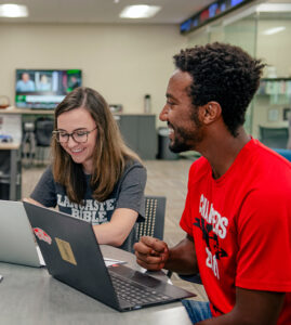 business students at a desk