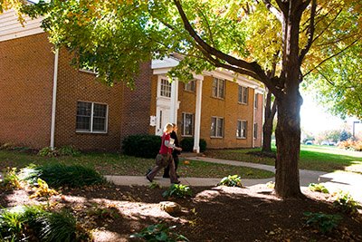 People walking through LBC's campus.