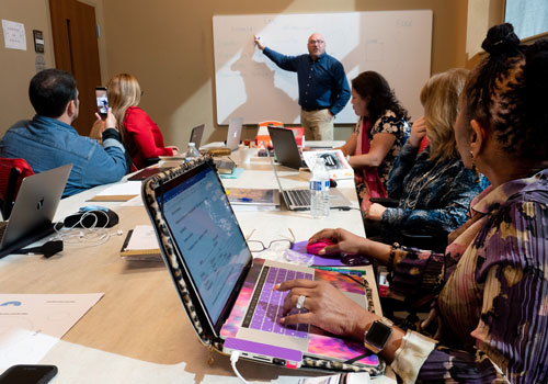 Provost Dr. Dearborn teaches a Doctoral cohort.