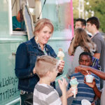 An icecream truck at homecoming.