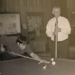 Mr. Peter Hook, VP for Student Services, took a break from his work to play a game of pool in the student center with Jesse Debinski.