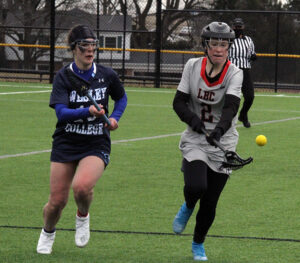 Women playing lacrosse