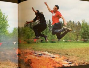 LBC students Marquis Boone and Javon Cole leap over the fire pit as part of the Shadey’s Rugged Run course. Shadey’s Rugged Run raised money for the Lancaster Bible College Athletics Department as well as Children’s Miracle Network.