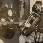 Two students play music in the dorms during the 1970-71 academic year.