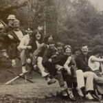 The Good Life Singers musical group took a tour of several states during the 1980-81 academic year and stopped at a park to take a picture on a slide.