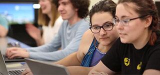 two female student working at their computers