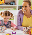 teacher works with child